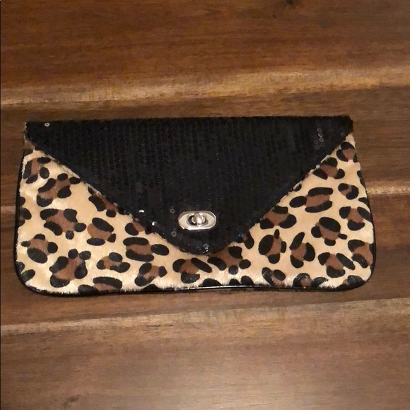 Rue21 Handbags - Rue 21 black and brown cheetah clutch bag